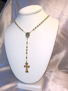 The Rosary Lariat is the perfect addition to any jewelry stack! This 24 inch lariet has a gothic inspired cubic zirconia cross. Choose from either silver (rhodium filled) or 18k gold (filled). No matter how you wear it, this necklace is sure to make a statement! Rosary Necklace Diy, Jewelry Stack, Number Jewelry, Number Necklace, Friendship Jewelry, The Rosary, Healing Crystal Jewelry, Crystal Healing Bracelets, Rosary Necklace