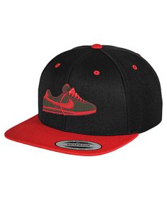 a black and red hat with the nike logo on it