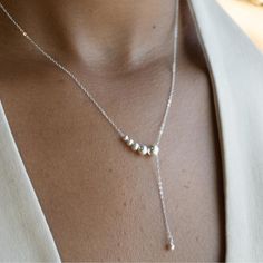 Discover our 925 Sterling Silver Necklace--a unique, minimalist delicate pearl pendant necklace, an ideal birthday gift for her or a thoughtful anniversary present. This affordable, adjustable chain jewelry is perfect for women--a versatile Mother's Day or best friend gift. Elevate your style with this modernist, delicate sterling silver necklace.  Chain Length- 16inch   Explore more necklaces within our collection -https://allurenl.etsy.com/listing/1656763227/ -https://allurenl.etsy.com/listing/1700699524/ -https://allurenl.etsy.com/listing/1704397932/ -https://allurenl.etsy.com/listing/1741792216/ Shipping & Satisfaction: We offer fast, reliable shipping for your convenience. Orders ships the next day from Netherlands. Local delivery in 3-5 days, and we ship internationally. Easily estim Minimalist Silver Lariat Pearl Necklace, Silver Minimalist Lariat Pearl Necklace, Minimalist Silver Lariat Necklace With Pearl Chain, Minimalist Dangle Charm Necklaces For Anniversary, Minimalist Dangle Charm Necklace For Anniversary, Sterling Silver Lariat Pearl Necklace With Pendant, Sterling Silver Lariat Pearl Necklace With Adjustable Chain, Elegant Sterling Silver Charm Necklace With Pearl Pendant, Elegant Sterling Silver Charm Necklace With Pearl