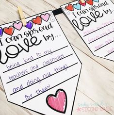 two valentine's day printables on clothes pins with hearts hanging from them