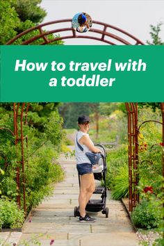 a woman pushing a stroller with the title how to travel with a toddler