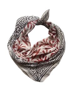 a red and white scarf with an intricate design on it's end, sitting in front of a white background