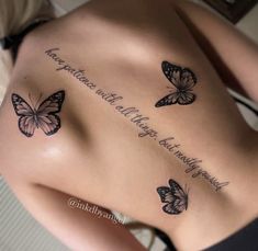 the back of a woman's stomach with butterflies on it and an inscription written in cursive writing