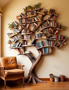 a tree with bookshelves on it in the middle of a room