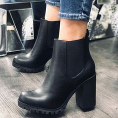 Get Ready To Be An Ultimate Trendsetter When You Step Out In These Lug Sole Booties. Smooth Faux Leather Shapes These Slip-On Boots That Have A Rounded Toe And Ankle-High Shaft With Black Gussets At The Instep And Out-Step. The Chunky Block Heel And Slight Platform Sole Give These Boots Some Major '90s Vibes! Pull Tab At Back. Condition: Brand New Color: Black Heel Height: 4.25" (Approximately) Fits: True To Size (M) Soda Boots Outfit, Trendy Closed Toe Heeled Boots With Chunky Platform, Trendy Heeled Boots With Chunky Platform And Closed Toe, Trendy Chunky Platform Heeled Boots With Closed Toe, Trendy High Heel Chelsea Boots With Stacked Heel, Casual Block Heel Chelsea Boots For Winter, Trendy Chunky High Heel Boots, Black Chelsea Boots For Fall Parties, Trendy Chelsea Boots With Block Heel