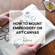 someone is embroidered on a napkin with the words how to mount embroidery on art canvass