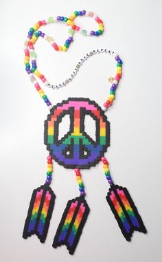 Handmade perler necklace with pony beads  Perfect for raves or festivals!  Crafted and shipped with love from Las Vegas Nevada! Rainbow Letter Beads For Festival, Fun Festival Beaded Necklace With Letter Beads, Handmade Multicolor Rave Necklaces, Rainbow Letter Beads Necklace For Festivals, Adjustable Playful Beaded Necklaces For Festivals, Adjustable Playful Beaded Necklace For Festival, Rave Perler, Perler Necklace, Bead Projects