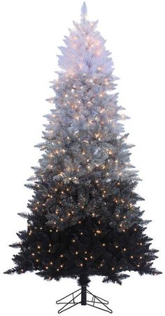 a white christmas tree with lights on it's top and bottom branches, in front of a white background