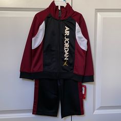 Brand New, With Tags, Nike Air Jordan Jumpman 2pc Tracksuit That Comes With Jacket And Pants. Classic Outfit Is In Burgundy Red And Black In Size 24mo. Jacket Has Zipper With Air Jordan Emblem And Pants Have Elastic Waist. Red Sports Sets For Winter, Red Winter Sports Sets, Sporty Red Long Sleeve Set, Red Long Sleeve Sports Sets, Baby Boy Overall, Baby Boy Disney, Air Jordan Red, Minnie Mouse Skirt, Red And Black Jacket