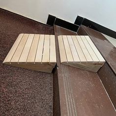 two pieces of wood laying on the floor