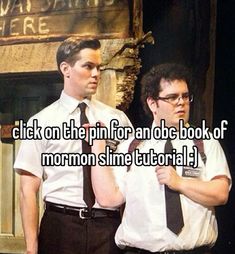 two men standing next to each other in front of a sign that says click on the pin for an robe book of mormon slime