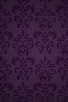 an ornate purple wallpaper pattern