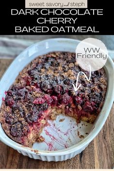 a close up of a pie in a pan on a table with the words dark chocolate cherry baked oatmeal