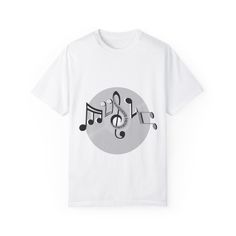 A music-themed T-shirt featuring the word "Music" spelled out in musical notes on a vinyl record. This unique design gives off a creative and artistic vibe, perfect for music lovers and enthusiasts. Ideal for casual wear or as a statement piece at music events and festivals. Product features - Available in sizes S to 4XL for the perfect fit - Double-needle stitching for durability - Without side seams for a more attractive look - Garment-dyed fabric for a soft color and texture - Made with high- White Music-themed Crew Neck T-shirt, Music-themed White Tops With Letter Print, White Hip Hop T-shirt For Concert, White Graphic Tee For Music Festival, Graphic Tee T-shirt With Logo Print For Concert, Music-themed Graphic T-shirt For Streetwear, Graphic Tee With Logo For Music Festivals, White Graphic T-shirt For Music Festival, Graphic Tee With Logo Print For Music Festivals