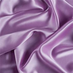 This high quality stretch charmeuse is made with a satin weave which is soft, yet supple and drapes beautifully. It is sponged and ready for the needle. The front side of the fabric has a satin finish, lustrous and reflective, and the back has a dull finish. Great for special occasions or that special outfit. Charmeuse Satin is an economically priced light weight Satin. Great for Wall treatments, curtains, backdrops. Most famously known for its ability to flow through the room and create wall an Silky Pajamas, Lavender Silk, Charmeuse Fabric, Pipe Decor, Lavender Aesthetic, Purple Wall, Color Aesthetic, Breast Tape Lift, Aesthetic Purple