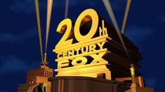 the 20th century fox sign is lit up at night