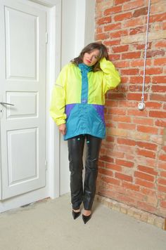 Stay stylish and protected from the elements with this Vintage 90s Regatta Color Blocking Windbreaker Jacket in size medium. This retro jacket features bold color-blocking in vibrant shades, capturing the essence of 90s fashion. Lightweight and durable, it's perfect for outdoor adventures or casual streetwear. The jacket includes a zip-up front, adjustable hood, and elastic cuffs to keep the wind at bay. Ideal for anyone looking to add a touch of vintage flair to their wardrobe. - Label: Regatta Green Color Block Windbreaker For Winter, Green Color Block Windbreaker For Streetwear, Retro Color Block Outerwear For Outdoor, Green Nylon Color Block Outerwear, Green Color Block Nylon Outerwear, Retro Color Block Outdoor Outerwear, 90s Inspired Multicolor Long Sleeve Outerwear, Vintage Color Block Windbreaker For Winter, Vintage Color Block Winter Windbreaker