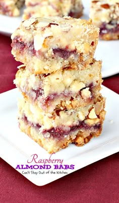 raspberry almond bars stacked on top of each other