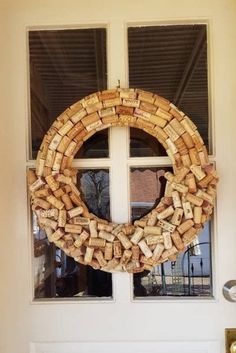 The Half Stacked Wine Corks Wreath is beautiful decor that can hang all year round and its a must have for any wine lover. This stunning wreath features a burlap wrapped base that is accented using a variety of both natural and synthetic recycled wine corks, with a mixture of corks from both red and How To Make A Wine Cork Wreath, Champagne Cork Wreath Diy, Fall Cork Wreath, Wreath Cork, Cork Wreaths, Square Craft, Wine Cork Projects Wreaths & Garlands, Cork Crafts Christmas, Wine Cork Wreath