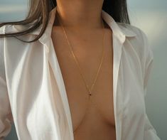 "**ZOOM for better detail *Water-safe Dainty, delicate, and perfect for everyday wear. Wear it with crop tops, basic tees, dresses, bikinis, and so much more. FEATURES: - 14k Solid Gold Garnet - 14k gold filled chain and clasp MEASUREMENTS: Top \"necklace\" measures 23 inches. Bottom \"belly\" measures 37 inches with a two inch extender. **If you need custom measurements other than the ones listed above, I will be happy to do so! Please write your preferred body chain measurements in the \"notes Gold Body Chain, Body Necklace, Gold Bodies, Real Gold Jewelry, Gold Bracelet Cuff, Belly Chain, Body Chain Jewelry, Body Jewellery, Gold Filled Jewelry