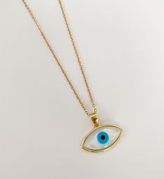 Evil eye necklace/charm Dainty mother of pearl and 18k gold plated eye charm. It will help you to stay away or protected from negative energies, bad vibes, envy, evil eye. Ideal for gifts. It's available only the charm or with the chain. MATERIAL AND SIZE 18k Gold plated Evil eye Mother of pearl 18k Gold filled chain Length: You can choose it If you have questions about the product, feel free to reach me out. Don't forget to check out my other items in the store: Https://www.etsy.com/shop/nyahwi Gold Plated Evil Eye Round Pendant Jewelry, Evil Eye Pendant Charm Necklace For Everyday, Evil Eye Pendant Charm Necklace, Everyday Evil Eye Pendant Charm Necklace, Gold Evil Eye Amulet Jewelry, Gold Plated Evil Eye Amulet Necklace, Gold-plated Evil Eye Amulet Necklace, Everyday Yellow Gold Evil Eye Charm Necklaces, White Evil Eye Jewelry Gift