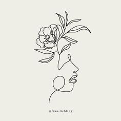 a line drawing of a woman's face with a flower in her hair