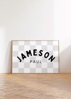 an empty room with a sign that says jameson on it and the word paul in black