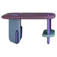 a purple and blue desk sitting on top of a wooden table