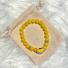 Brand New Handmade Pompompurin Yellow Jade Bracelet Standard Size 7 Inches Plus Stretch 7-8mm Semi-Precious Stones / Beads Silver Plated Crystal Spacers Fashion Character Charm Yellow Jade - Loyalty, Family & Friendship Comes From A Smoke Free And Pet Free Home In California. Bundle & Save! Yellow Beaded Bracelets With Smiley Face For Gifts, Yellow Smiley Face Beaded Bracelets For Gifts, Cute Yellow Beaded Bracelets For Gift, Casual Yellow Round Beaded Bracelets, Casual Yellow Beaded Bracelets, Pompompurin Jewelry, Pompompurin Bracelet, Pum Pum, Puffy Heart Necklace