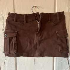 Nwot Never Worn Brown Jean Short Skirt Size 6 Fitted Brown Skort With Pockets, Brown Mini Skort With Pockets, Brown Cotton Mini Skirt With Pockets, High Waist Brown Skort With Pockets, Brown Mini Skirt With Pockets, Casual Brown Skort With Pockets, Trendy Brown Skort With Pockets, Brown Jean Skirt, Skirt Belts