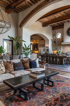 a living room filled with furniture and lots of windows