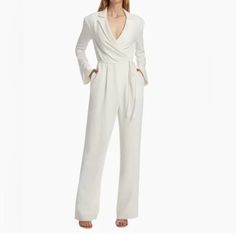 Enhance Your Wardrobe With The Stylish Macie Jumpsuit. This Belted One-Piece Features Collared Notched Lapels And Full Pants, Perfect For Transitioning From Desk To Dinner In Sophisticated Sophistication. Feel Confident In Your Look All Day Long. Details Hiddern Zipper On Side Fabric: Drapey Crepe Straight Leg Belted Detail Full Length Line Drawn Through The Name To Prevent Store Returns. All Items Were Purchased As Final Sale Merchandise. If You Need Additional Information Or Pictures Please As Elegant White Long Sleeve Jumpsuit, White Long Sleeve Jumpsuits For Evening, White Long Sleeve Jumpsuits And Rompers For Evening, White Long Sleeve Pantsuit For Spring, Elegant White V-neck Jumpsuit, White V-neck Jumpsuits And Rompers For Formal Occasions, White Long Sleeve Evening Pantsuit, White Spring Formal Pantsuit, White Formal Pantsuit For Spring