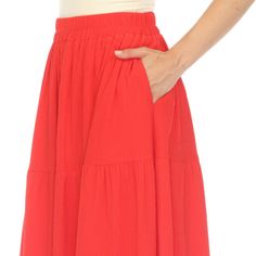 Elevate your fashion game with this flowy and effortlessly chic skirt. This maxi skirt from White Mark boasts a pleated design that adds texture, movement, and a touch of sophistication to your look. Dress it up or down as this skirt is incredibly versatile. Pair it with a tucked in blouse and heels for a sophisticated look or go for a more relaxed vibe with a tucked in tee and sandals and pair it with a jacket on chilly days. It’s perfect for various occasions and style preferences. Solid Color Tiered Maxi Skirt For Day Out, Summer Tiered Maxi Skirt With Pleated Waist, Flowy Gathered Midi Skirt, Flowy Midi Length Gathered Skirt, Casual Voluminous Maxi Skirt With Pleated Waist, Summer Pleated Waist Flared Maxi Skirt, Tiered Skirt With Pleated Waist, Tiered Maxi Skirt With Pleated Waist, Flowy Tiered Skirt With Pleated Hem