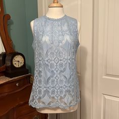 This Blouse Has Never Been Worn. It Is In Excellent Condition. Nwot. It Has A Matching Light Blue Camisole Underneath For Modesty. Sleeveless Lace Blouse, Lace Poncho, Layered Cami, Silver Blouse, Women Shirt Top, Maternity Blouse, Printed Sleeveless Blouse, Henley Top, Spring Tops