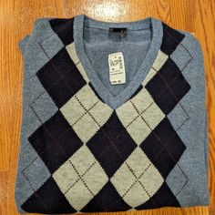 Jos. A. Bank Argyle Sweater. Xxl. Grey Base With Blue And Cream . New With Tags. V-neck Top With Argyle Pattern For Fall, Fall Argyle V-neck Top, Fall V-neck Top With Argyle Pattern, Winter V-neck Argyle Pattern Top, Casual Argyle Pattern Top For Fall, Casual Long Sleeve Argyle Pattern Tops, Casual Long Sleeve Argyle Top, Casual Argyle Pattern Crew Neck Tops, Casual Argyle Crew Neck Tops