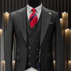 This Modern Fit Suit Features A Wide Peak Lapel, 1 Button Closures, Double Breasted Vest, Side Vents, And Matching Flat Front Pants. Black Double-breasted Tuxedo For Office, Double-breasted Business Sets With Button Closure, Black Single Breasted Sets For Office, Black Single-breasted Sets For Office, Black Single-breasted Suit For Semi-formal Occasions, Black Slim Fit Office Sets, Black Wedding Suit With Hidden Button Closure, Business Tuxedo Suit With Button Closure, Black Double-breasted Tuxedo For Business