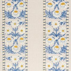 a blue and white wallpaper with flowers on the border is shown in this image