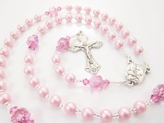 "- Personalized handmade rosary made with pink Czech glass pearls and crystals - Choice of medals and letters - Comes with a velour pouch and gift box This is for a little girl who LOVES PINK! This bubblegum pink handmade baptism rosary is made with matte pink Czech glass pearls and crystals and big pink Czech cathedral beads. It's a very cheerful rosary design. Comes with your choice of Baptism, First Communion, Confirmation, or other medals. Read below for details. Over 80 colorful designs to Spiritual Pink Jewelry For Birthday, Pink Rosary With 8mm Round Beads, Pink Beaded Spiritual Rosary, Pink Rosary With 8mm Beads For Gift, Pink Rosary With 8mm Beads As Gift, Handmade Pink Rosary With Round Beads, Pink 8mm Bead Jewelry For Valentine's Day, Pink Beaded Rosary With Round Beads, Pink 8mm Beads Jewelry For Wedding