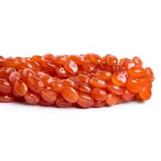 Beads average about 10x8mm with roughly 30 pieces per strand. Carnelian Gemstone Oval Beads, Oval Carnelian Gemstone Beads, Oval Carnelian Beads, Black Gold Chain, Enamel Plate, Rose Gold Beads, Pearl Shop, Oval Beads, Tourmaline Beads