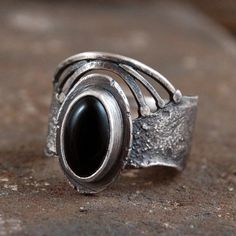 "Onyx and silver ring. Dimensions:  -stone 0.6 - 1.2 cm, 0.24 - 0.47\" -size adjustable (please write me your size, I'll set it)." Unique Black Ring With Oxidized Finish, Unique Black Oxidized Finish Ring, Round Onyx Cabochon Rings, Onyx Cabochon Rings, Adjustable Onyx Rings With Black Enamel, Spiritual Onyx Ring Jewelry, Silver Onyx Cabochon Rings, Statement Ring Silver, Oxidized Silver