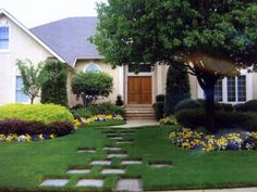 a house with landscaping in the front yard