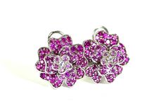 These wonderful pierced earrings feature a floral design and are each accented with 11, bead sets of round brilliant cut natural pink sapphires, and 2 round brilliant cut diamonds in the center.  The earrings measure 16.5mm X 16.5mm and are finished with omega-style backs. Vintage but like new! total weight earrings 7.9gram Sapphire 1.5 ctw approx #0024 Vintage Sapphire Earrings, Pink Sapphire Earrings, Hot Pink Roses, Vintage Sapphire, Flower Tops, Gemstone Studs, Sapphire Earrings, Pierced Earrings, Round Brilliant Cut Diamond