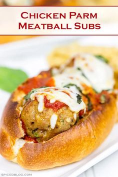 chicken parm meatball subs on a white plate