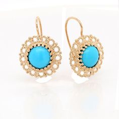 Gold Turquoise Earrings Wire Back Drop Gemstone Blue Stone Antique Reproduction Antique reproduction with twisted wire work set with a cabochon turquoise (Approx. 1.6cttw, 9mm x 9mm) and wire back gold. Earrings are 15mm tall and 15mm wide (6/10 x 6/10 inch) and made of 14k yellow gold. PROUDLY MADE FROM SCRATCH IN NEW YORK CITY. SKU: E233MA Our Pledge: 1. All items to be BRAND NEW and authentic. 2. All gemstones to be 100% genuine and mined from the earth. 3. Jewelry guaranteed to be solid 14kt Yellow Gold Cabochon Round Earrings, Yellow Gold Cabochon Earrings, Yellow Gold Round Cabochon Earrings, Formal Turquoise Oval Earrings, Turquoise Oval Earrings Fine Jewelry, Fine Jewelry Turquoise Oval Earrings, Turquoise Oval Fine Jewelry Earrings, Fine Jewelry Oval Turquoise Earrings, Elegant Cabochon Earrings