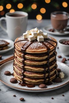 A photo of a  Hot Chocolate Pancakes a Christmas Pancake Recipes Winter Pancakes, Fancy Pancakes, Winter Marshmallows, Hot Chocolate Pancakes, Pancakes Chocolate, Christmas Pancakes, Hungry Man, Food Reference, Homemade Pancake Recipe