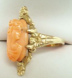 Art Nouveau Oval Genuine Natural Coral Cameo Ring (#2227) Gold Oval Cameo Rings, Oval Cameo Yellow Gold Ring, Art Deco Oval Cameo Rings, Collectible Yellow Gold Oval Rings, Oval Yellow Gold Cameo Ring, Oval Yellow Gold Rings, Yellow Gold Cameo Ring Fine Jewelry, Antique Orange Oval Ring, Antique Oval Yellow Gold Rings