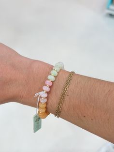 Accentuate your style with the Spartina Green & Pink 10mm Stone Stretch Bracelet. Made with gold plated stone beads, this stretch bracelet effortlessly adds a touch of elegance to any outfit. Feel and look your best with this beautiful and versatile accessory. Casual Gold Bracelet With Faceted Beads, Casual Gold Bracelets With Faceted Beads, Gold Stretch Bracelet With Natural Stones For Everyday, Casual Gold Jewelry With Faceted Beads, Casual Gold Beaded Bracelets With Gemstone, Trendy Gold Stretch Bracelet With Faceted Beads, Chic Boutique, Stretch Bracelets, Stone Beads