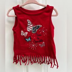 New Without Tags, Has Cute Fringes On The Bottom Cute Red Sleeveless Top, Fun Red Sleeveless Top, Fun Red Cotton Tops, Red Tops For Spring Playtime, Red Cotton Top For Playtime, Red Cotton Tops For Playtime, Cute Red Cotton Top, Red Sleeveless T-shirt For Spring, Patriotic Shirts