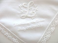 the wedding handkerchief has been embroidered onto it