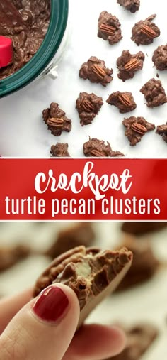 a hand holding a piece of chocolate turtle pecan clusters in front of a bowl of cookies